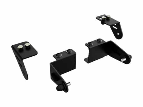 Four black metal mounting brackets with bolts and spacers, laid out for assembly
